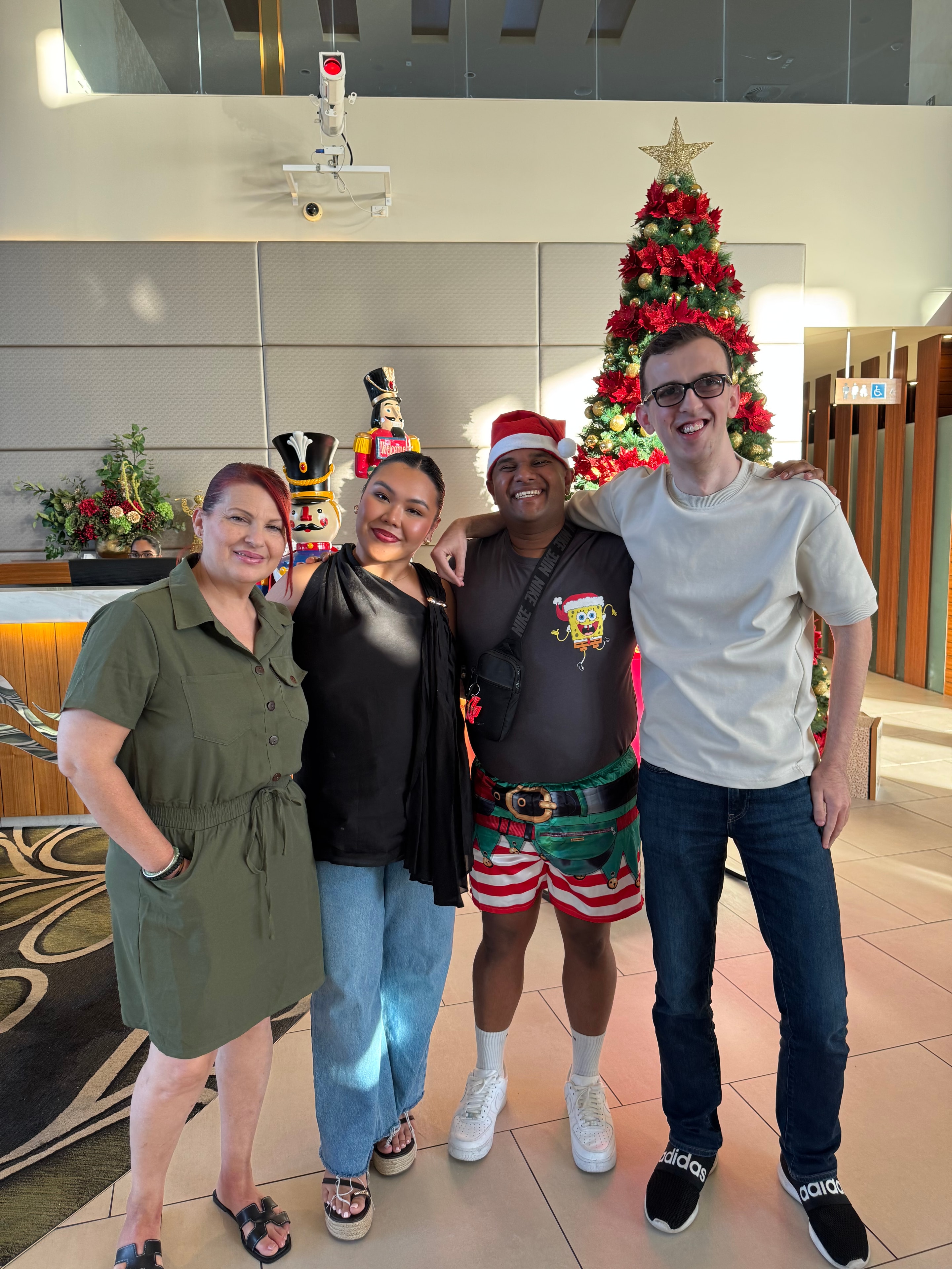 Participants and staff celebrating Christmas together